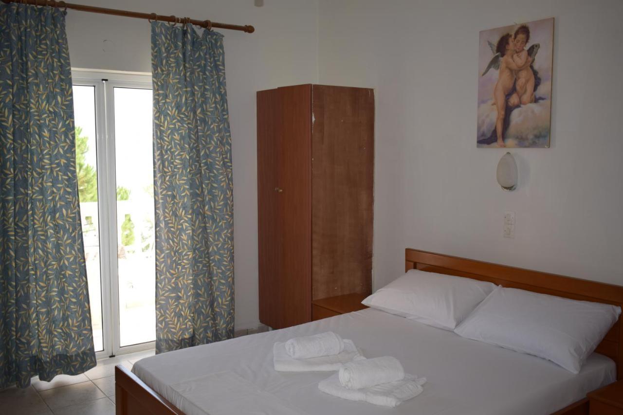 Red Sun Apartments Amoudi Bagian luar foto